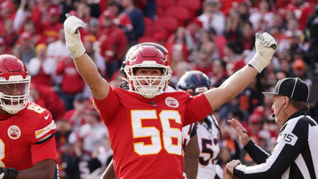 Jan 1, 2023; Kansas City, Missouri, USA; Kansas City Chiefs defensive end George Karlaftis (56) celebrates after a sack against the Denver Broncos during the first half at GEHA Field at Arrowhead Stadium. Mandatory Credit: Denny Medley-USA TODAY Sports